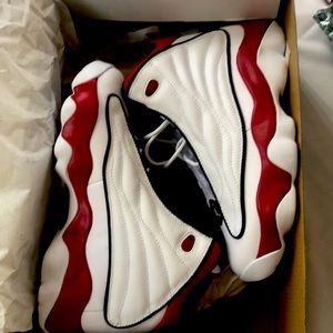 Jordan pro strong (GS) brand new size 6.5Y ..fits woman’s size 8 red and white